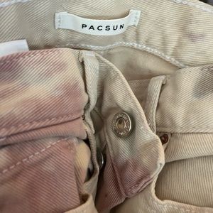 Paint splatter, cream colored jeans